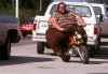 Fat_guy_on_a_little_motorcycle.jpeg